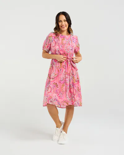 Model wearing Whimsy Swiri Joana Dress By Seduce Available at Beetees Nelson